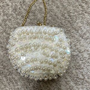 LaRegale Vintage Pearl-Embellished Beige Clutch with Gold Chain